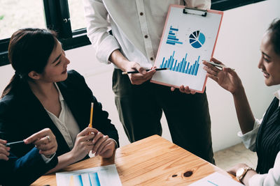 Business colleagues working in office