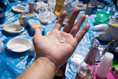 High angle view of hand holding ice cream