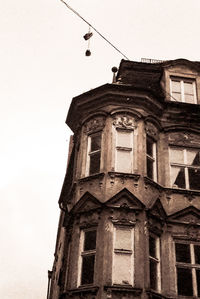 Low angle view of old building against sky