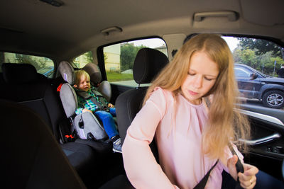 Mother and son in car