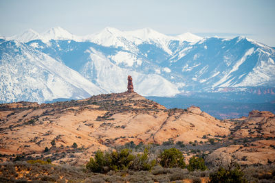 Scenic view of snowcapped mountains against sky