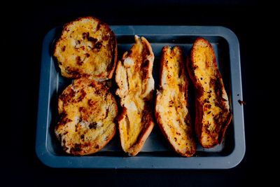 High angle view of meat on barbecue grill