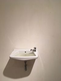 Bathroom sink attached in wall
