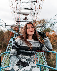 Portrait of smiling young woman in winter