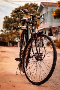 Bicycle parked on footpath in city