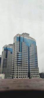 Low angle view of modern building against sky