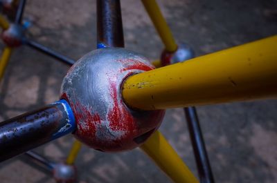 Cropped image of jungle gym at playground