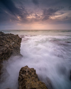 Scenic view of sea against sky during sunset