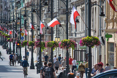 People walking on street in city