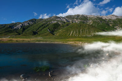 Small lake with fog in the valley of campo imperatore abruzzo