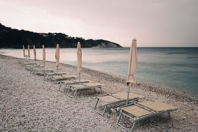 Scenic view of beach against clear sky