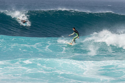 Man surfing in sea