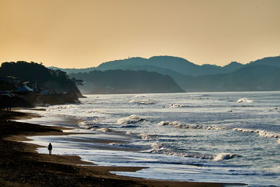 Scenic view of sea against sky during sunset