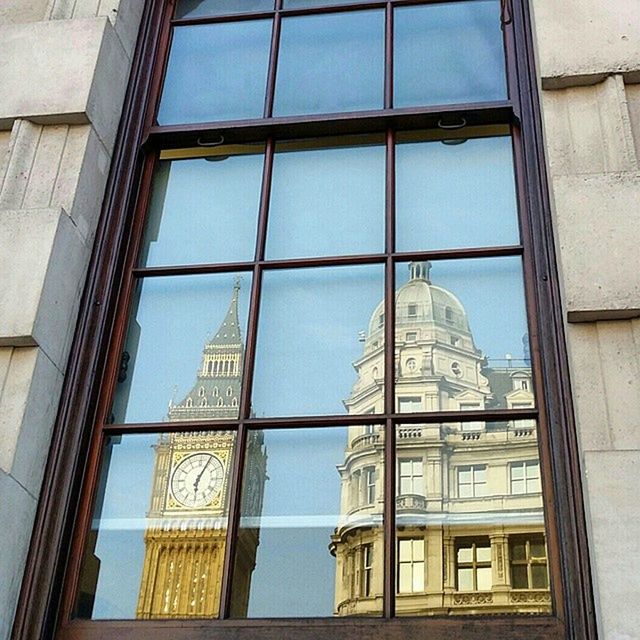 architecture, built structure, building exterior, window, glass - material, low angle view, building, reflection, modern, city, office building, transparent, day, sky, residential structure, residential building, no people, glass, outdoors, geometric shape