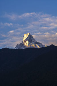 Scenic view of mountains against sky during sunset