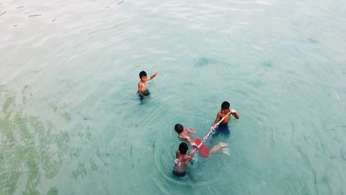 High angle view of people in swimming pool