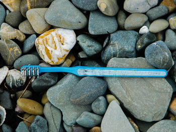 Toothbrush on pebbles