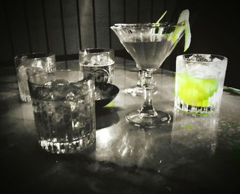 Drinking water in glass on table