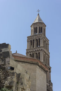 Low angle view of historic building against clear sky