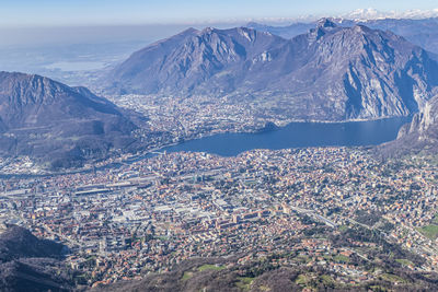 Aerial view of snowcapped mountains against sky