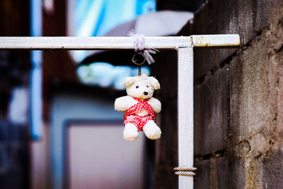 Close-up of toy hanging on wood