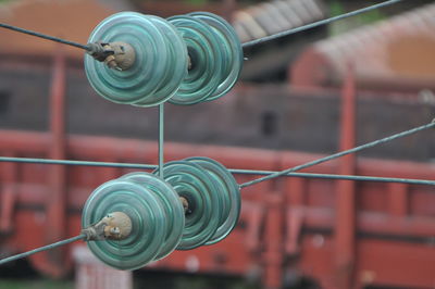 Close-up of spiral rope hanging on metal