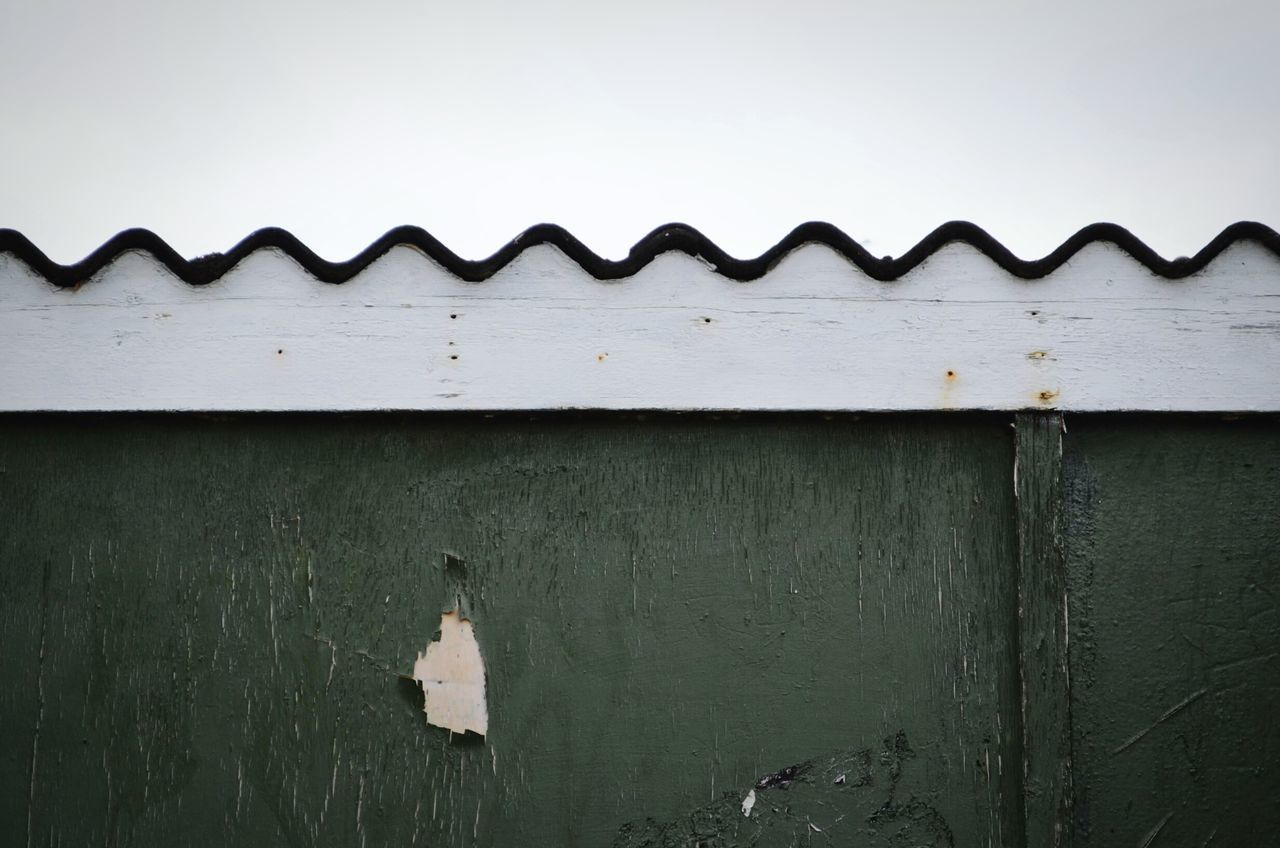 CLOSE-UP OF OLD WEATHERED WALL