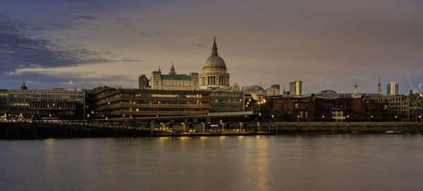 View of st. pauls cathedral across the river thames in london, uk 