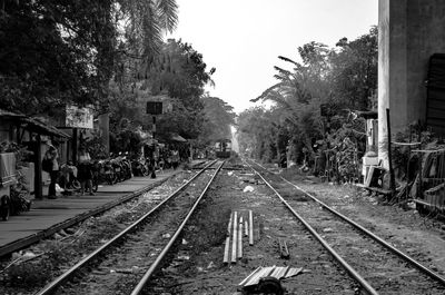 Railway tracks against clear sky