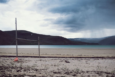 Scenic view of sea against cloudy sky