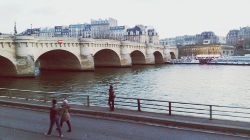 Arch bridge over river