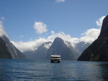 Scenic view of sea against mountains