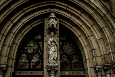 Low angle view of statues on building