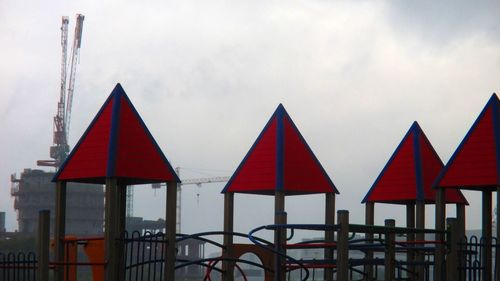 Traditional windmill against sky