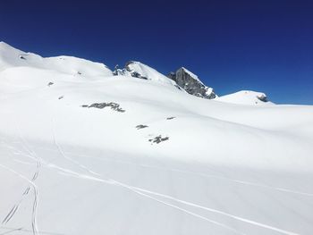 Scenic view of snow covered mountain