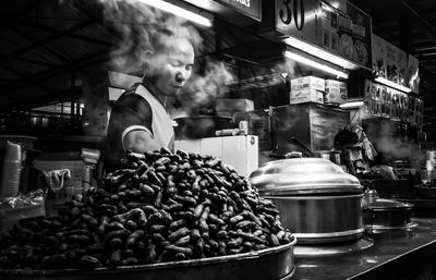 Man preparing food in restaurant