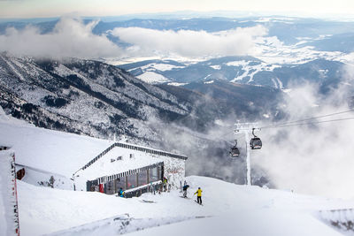 Snow covered mountain against sky