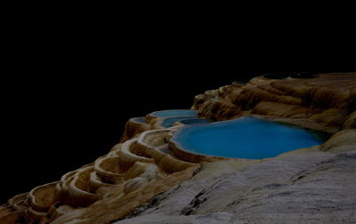 Scenic view of sea against sky at night