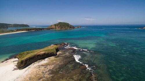 Scenic view of sea against blue sky