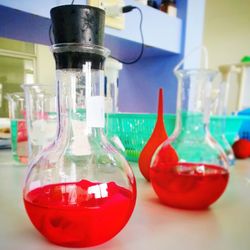 Close-up of red wine in glass on table
