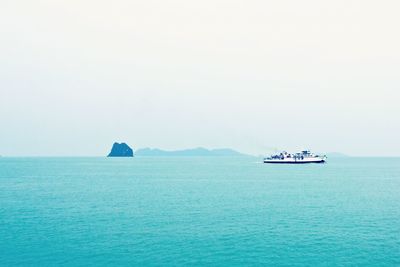 Boat sailing in sea