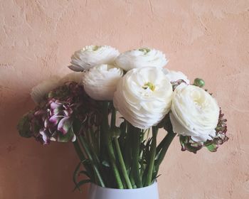 Close-up of vase against the wall