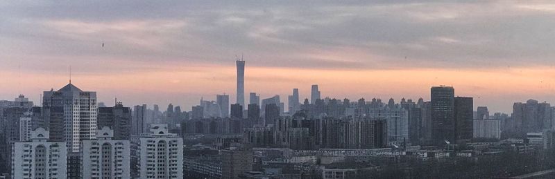 View of cityscape against sky during sunset