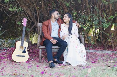 Young couple kissing in park