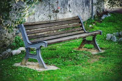 Close-up of empty chair on grass