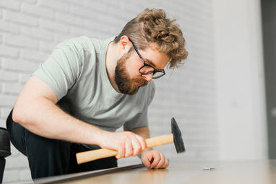 Portrait of senior man working at home