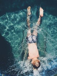 Woman swimming in pool