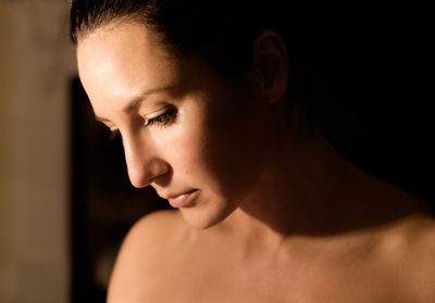 Close-up of topless young woman