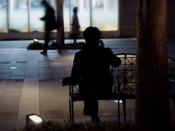 Woman sitting in park