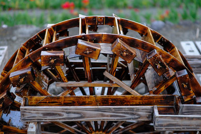 High angle view of wet water wheel at watermill